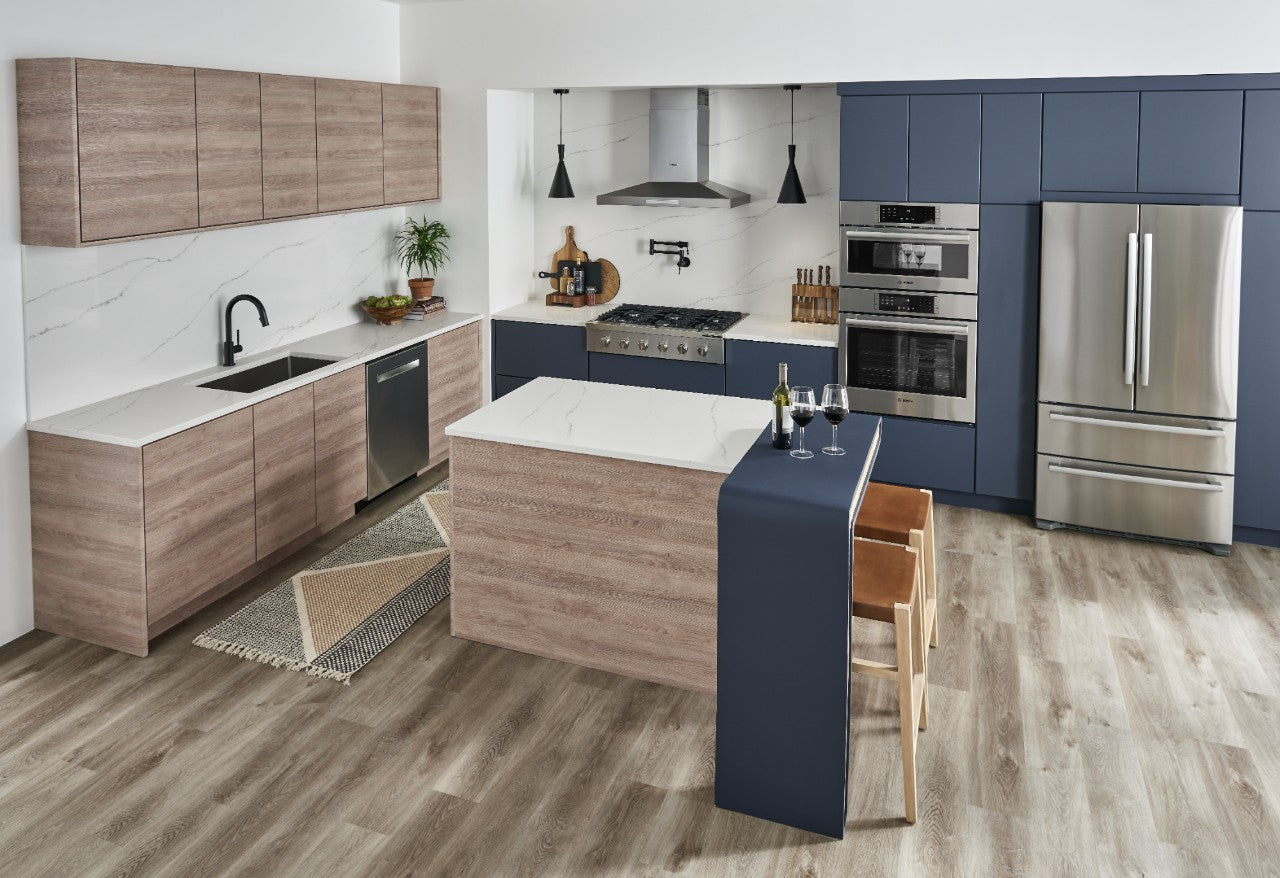 Calacatta Arno countertops and backsplash with navy cabinets
