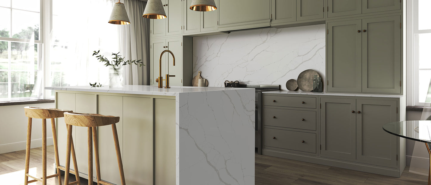 New Calacatta Laza Quartz kitchen island, countertop and backsplash